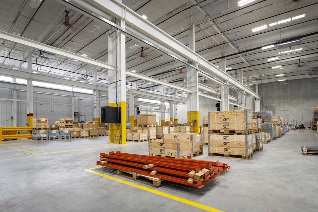 A large warehouse with boxes around it